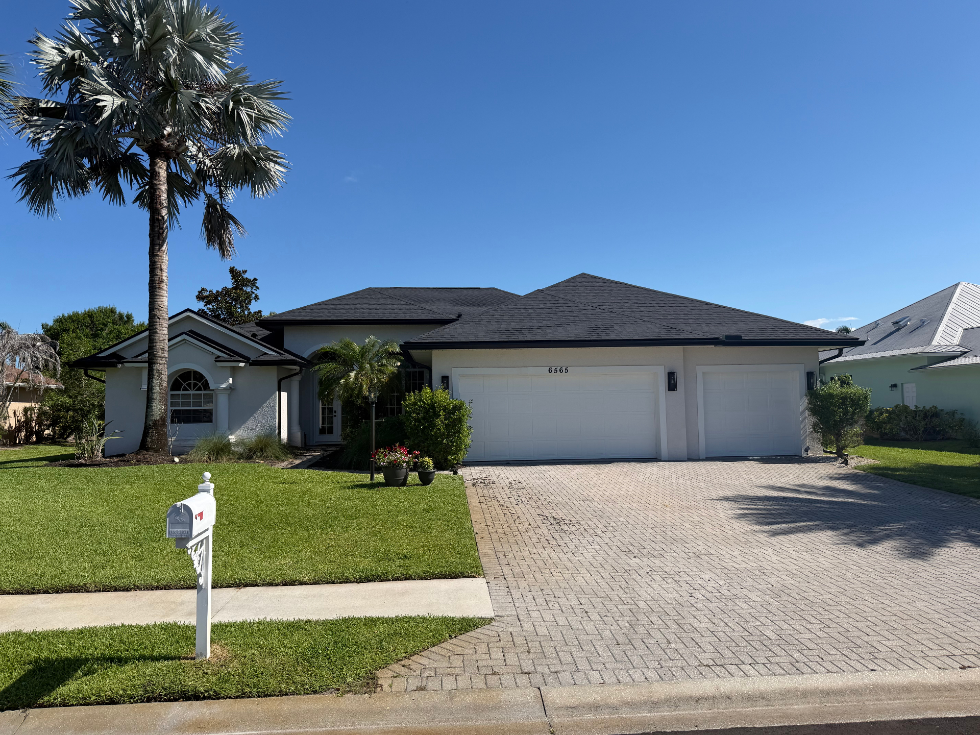 Completed asphalt shingle roof installation by ProCraft Renovations
